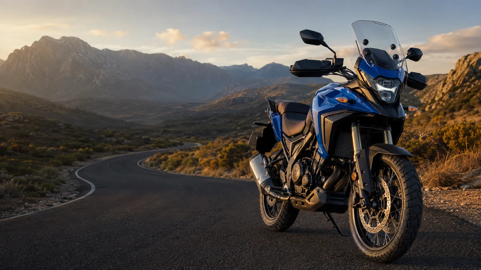 Blue adventure motorcycle on an open road through the Overberg