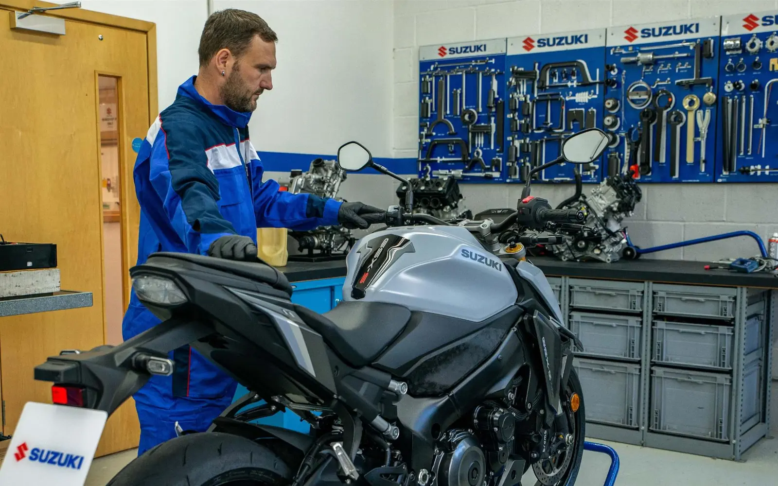 Motorcycle bodywork being prepared for refinishing