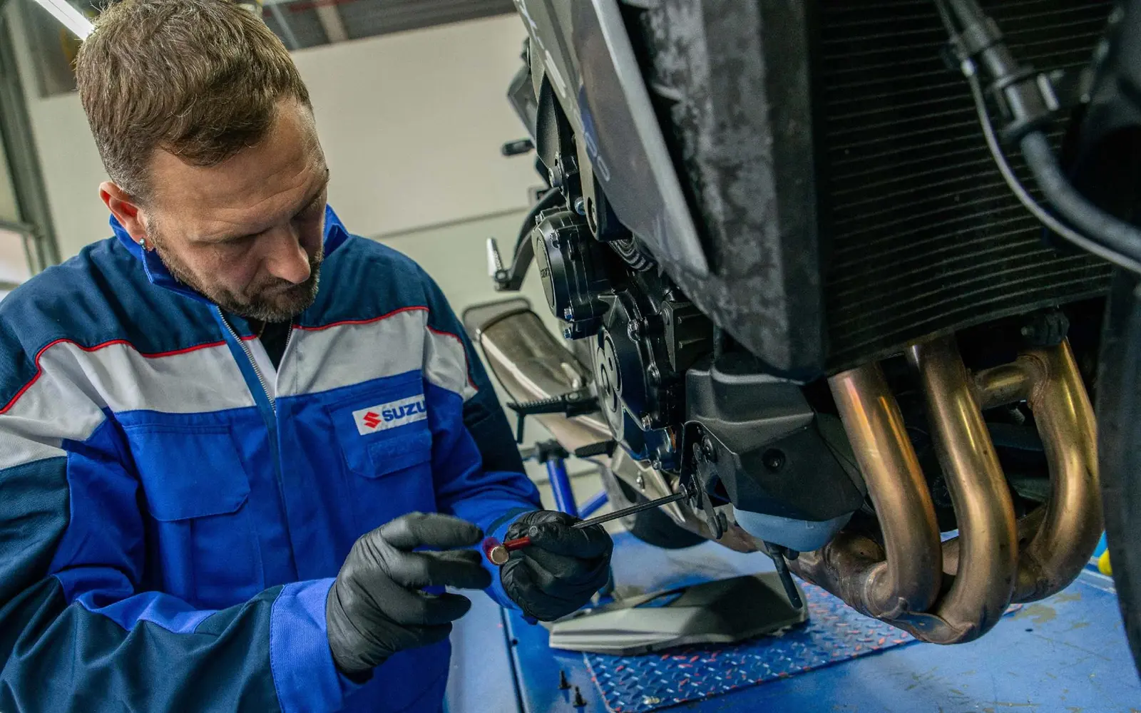 Hands-on mechanical work in the Overberg Suzuki workshop